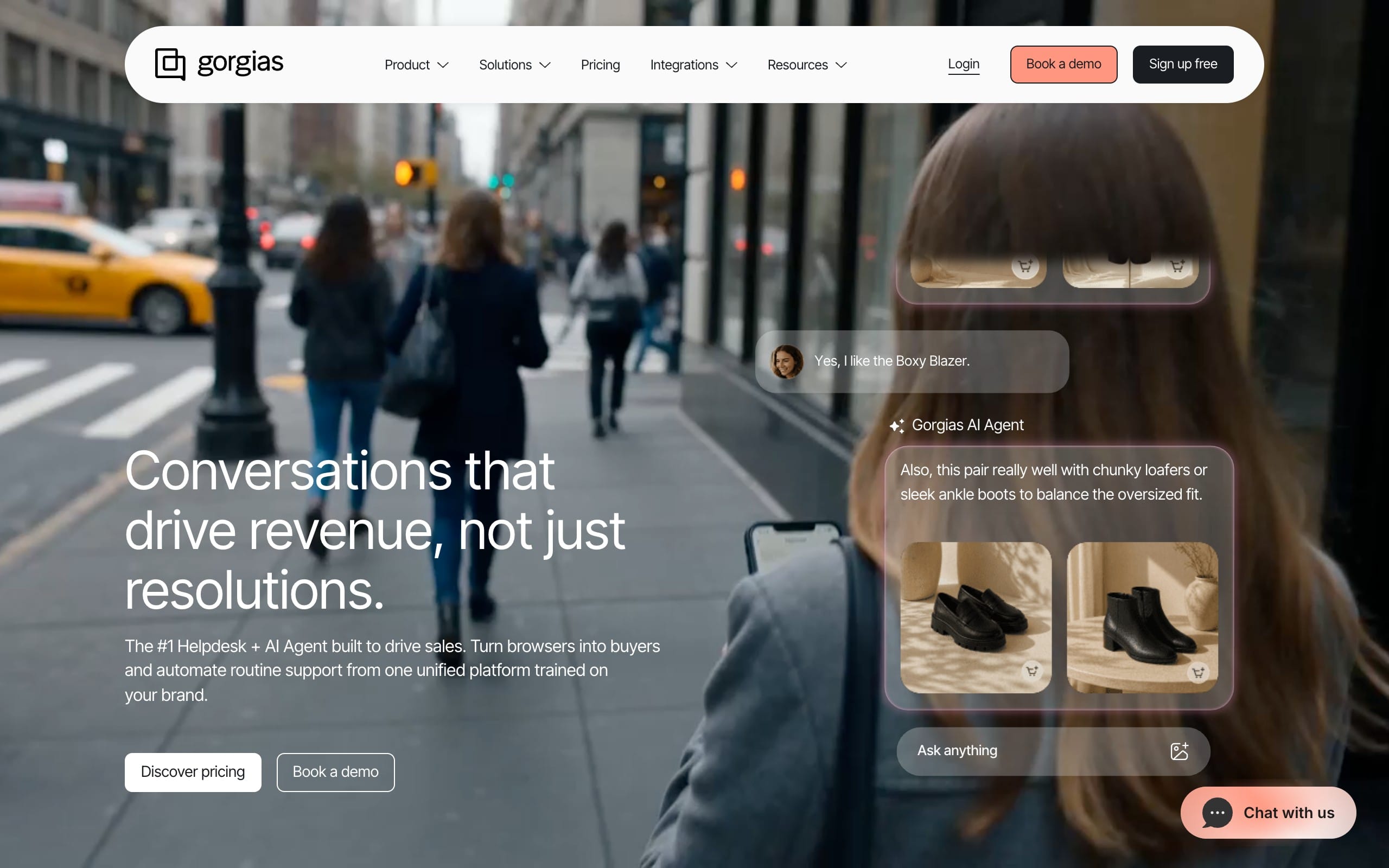 Gorgias homepage hero section showing the conversational AI platform for ecommerce with a city street background, headline about driving revenue and AI agent chat overlays, and top navigation with Book a demo and Sign up free buttons.
