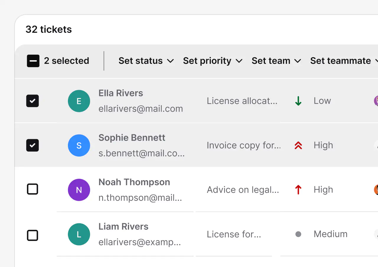 Bulk actions bar setting status, priority, and team for selected tickets in HelpDesk.com